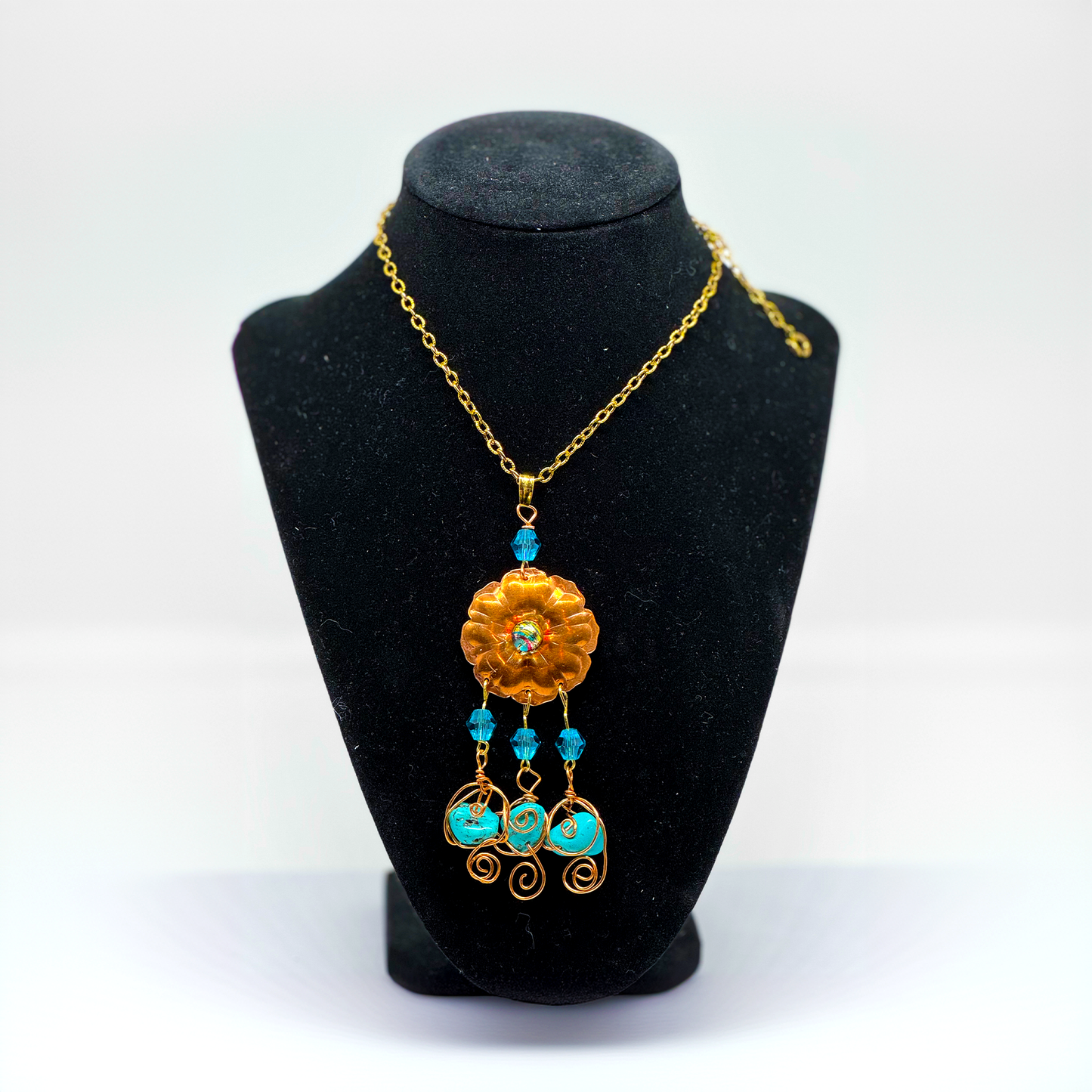 EMBOSSED FLOWER WITH TURQUOISE FROM KINGMAN NECKLACE