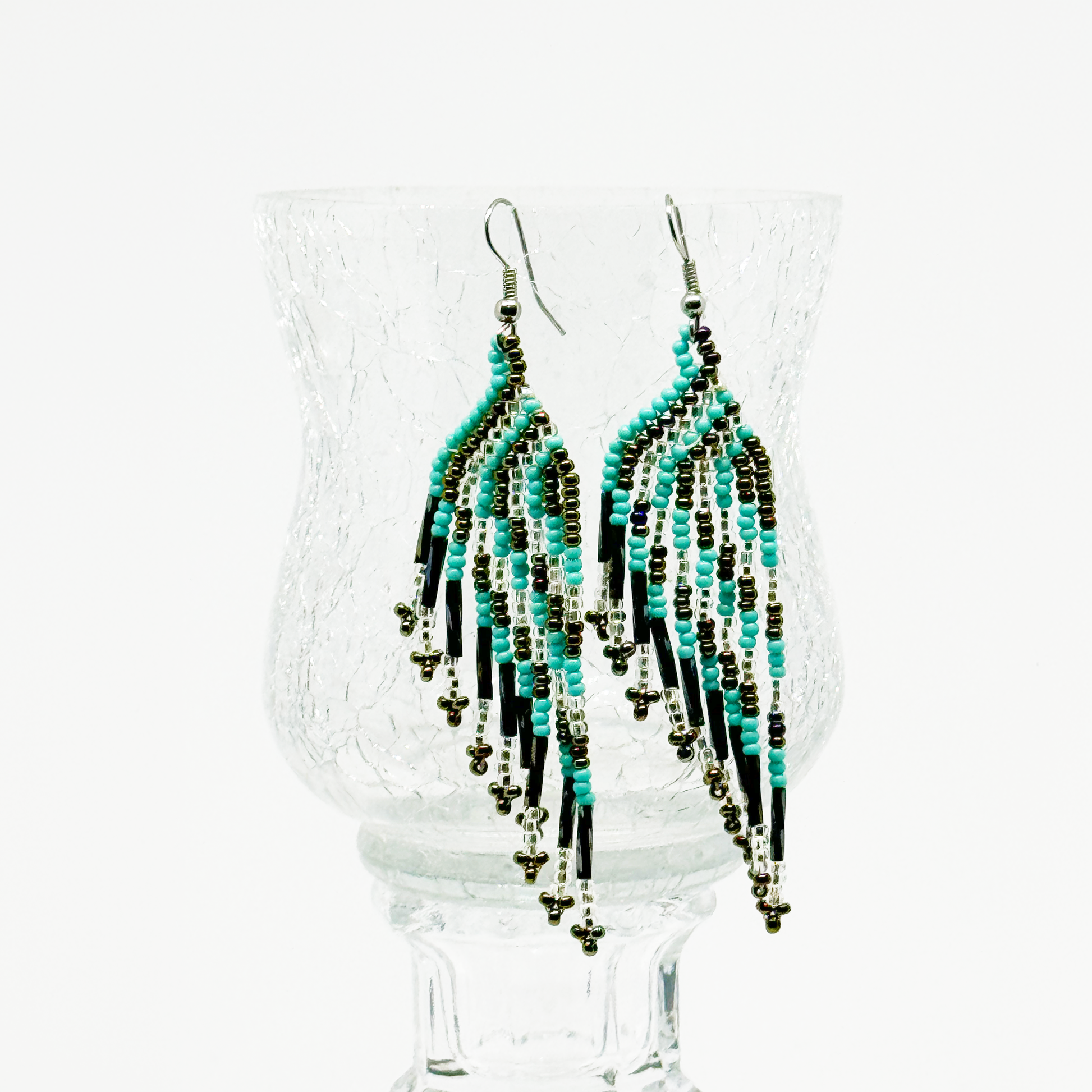 Color is Turquoise Silver and black beads Necklace and Earring to match $65-00